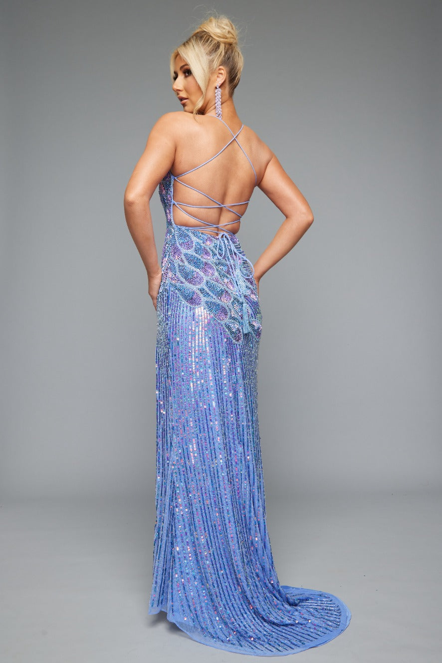 Back view of Jasz Couture Style 7640: a periwinkle beaded prom dress featuring a high slit, sexy back, and spaghetti straps crafted to shine on the dance floor.