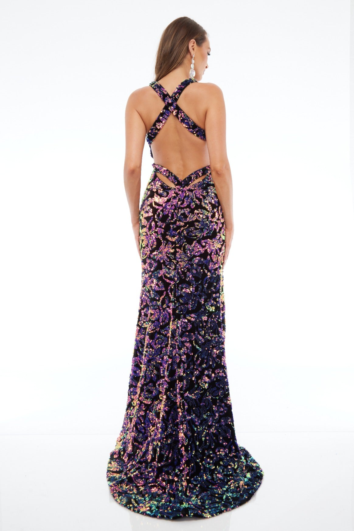 Back view of Style 7641: a dazzling multicolored prom dress featuring a beaded design, high slit, open back, and V Neckline.