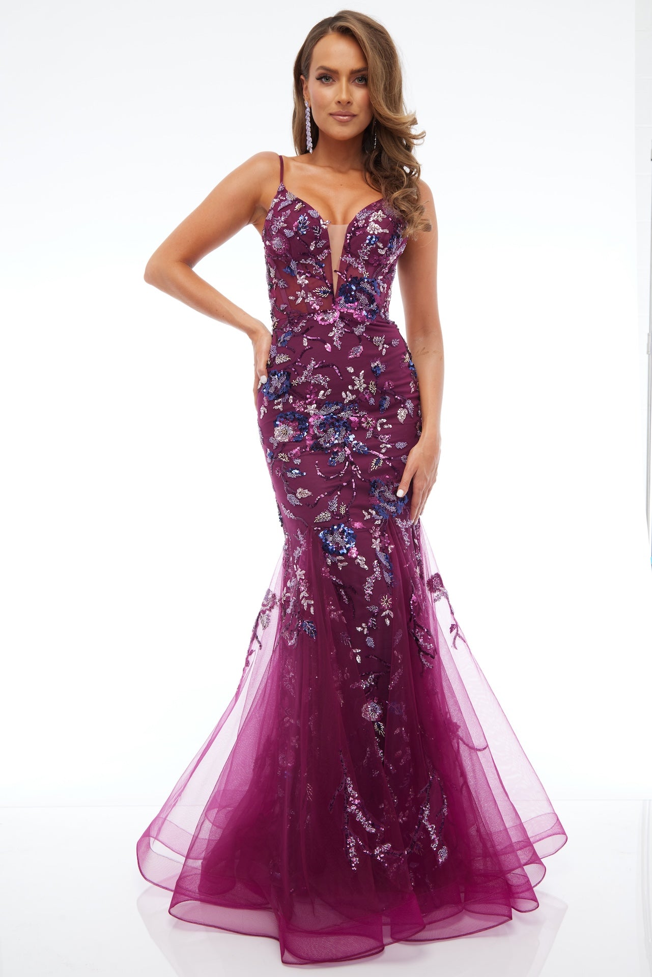 Front view of Jasz Couture Style 7619: a best-selling prom dress with a mermaid silhouette, tulle skirt, and applique details in wine.