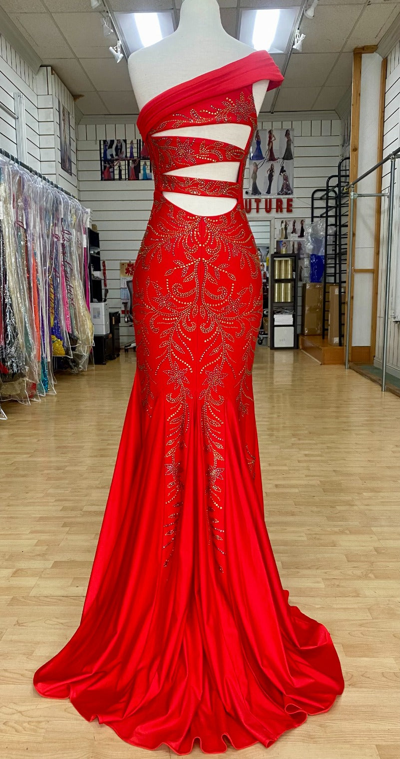 Back view of style 7621 prom dress with a beaded design, cut outs, and a unique one-shoulder off the shoulders neckline shown in RED, offering an elegant look.