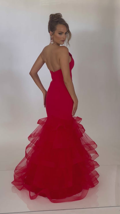 Video of Style 7670: a captivating fitted red prom dress with a strapless plunge neckline and tulle skirt. 