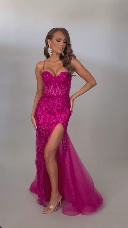 Video of Jasz Couture Style 7652: an elegant best selling fuchsia beaded prom dress with a corset lace up detail and spaghetti straps.