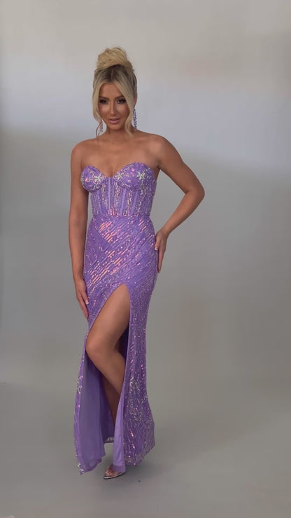 Video of Style 7649: an elegant lilac prom dress featuring a beaded design, high slit, and strapless sweetheart neckline.