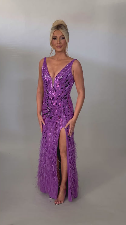 Video of Style 7634: an enchanting prom dress featuring fringe, a high slit, mirror accents, and a plunge neckline. Available in blush, lilac, and slate and a must-have for prom night.