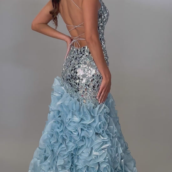 Radiant fitted sky blue prom dress with stunning mirror details, ruffle skirt, and lace up back design. 