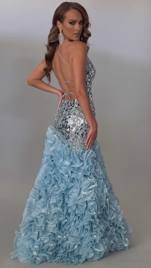 Radiant fitted sky blue prom dress with stunning mirror details, ruffle skirt, and lace up back design. 