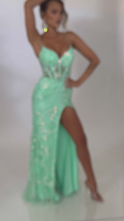 Video of Style 7690: an enchanting mint prom dress featuring applique and corset details, a high slit, and spaghetti straps.