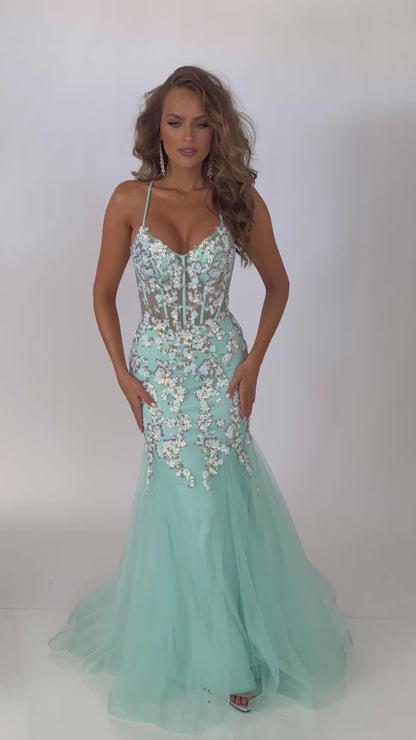 Video of Style 7700: a chic mint prom dress featuring applique details, corset lace up back, spaghetti straps, and tulle skirt. 